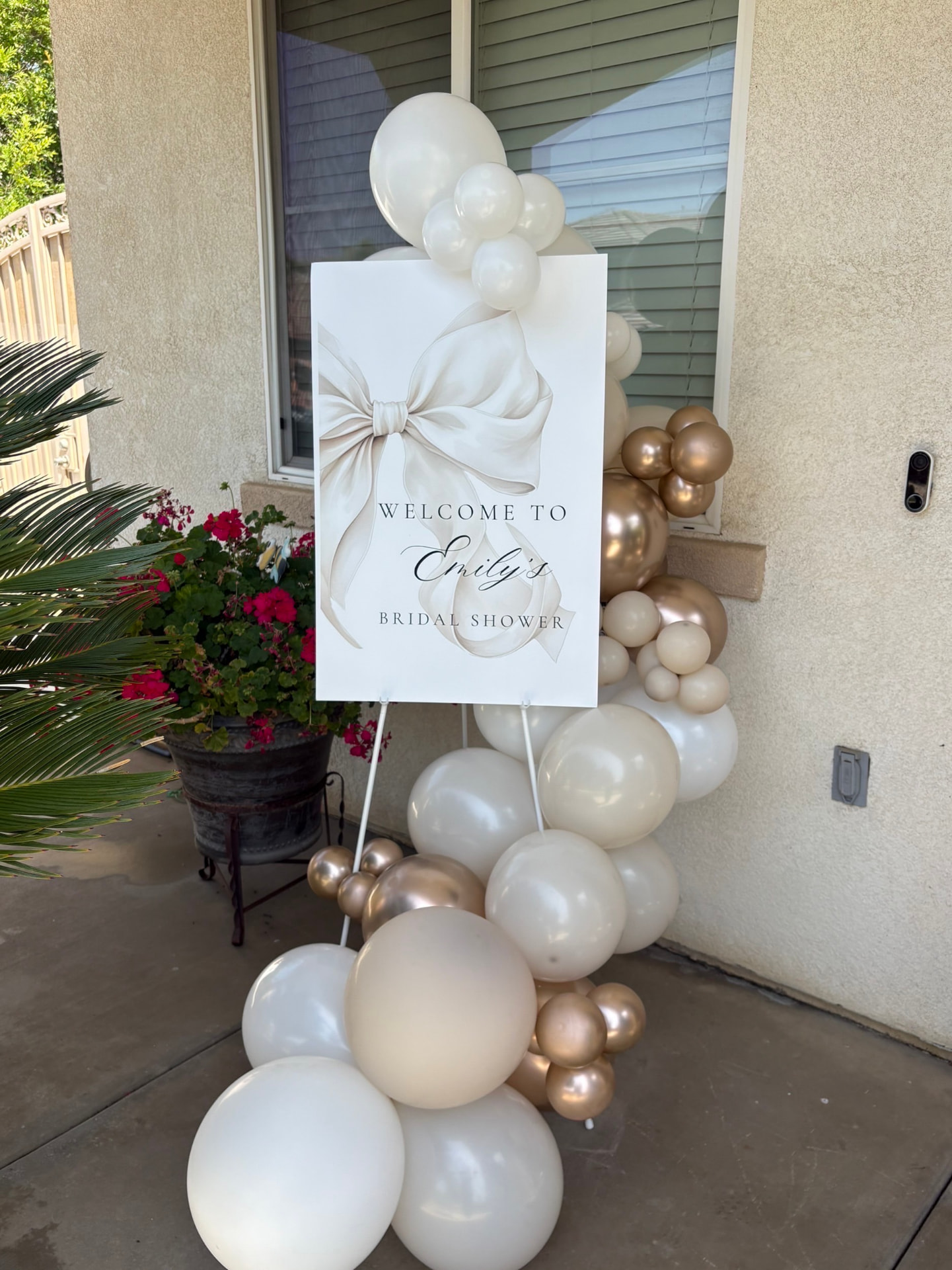 Ivory and champagne bridal shower balloon display